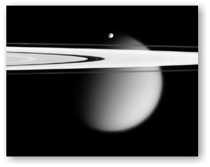 Saturn's rings, Epimetheus (above) and Titan (b.g.)